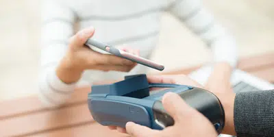 digital wallet mobile device scanned in a POS terminal