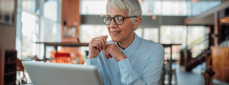 woman working on laptop to collect late payments